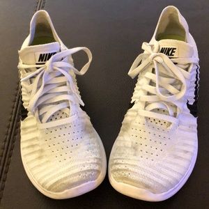 Nike White Flyknit Sneakers